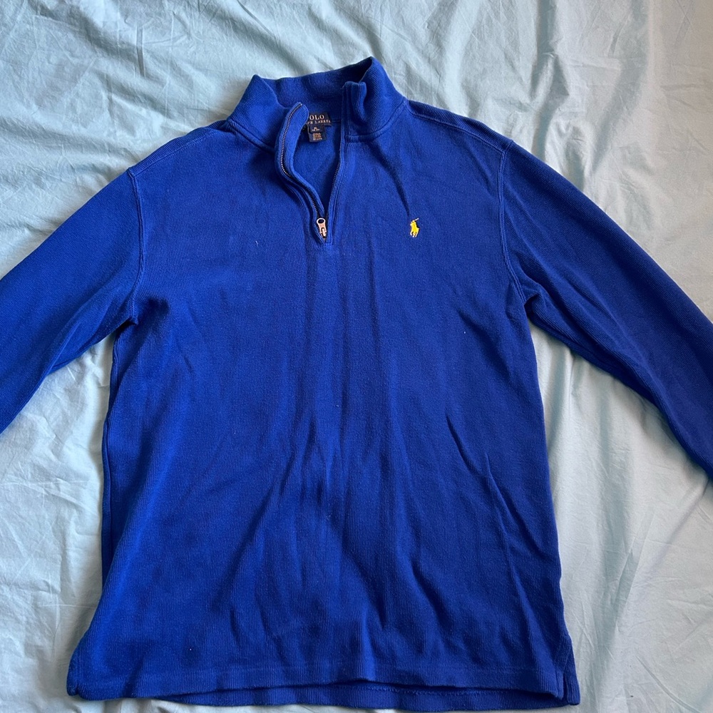 Blue polo pullovers